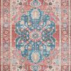 Skye Brick / Ocean Rug with classic old-world design in blue and brick red tones with floral motifs