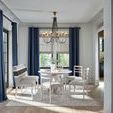 Dining room scene with Peyton Banquette, light wood dining table and chairs, blue curtains, and chandelier.