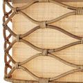 Close-up showing textured grasscloth shade behind intersecting rattan binding