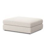 Angled view of Bloor ottoman showing rounded cushion edges and fabric detail