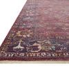Side-angle view highlighting low pile thickness and fringed edge on the Giada Grape rug