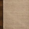 Close-up top view of rug on dark wood floor emphasizing vertical stripe pattern