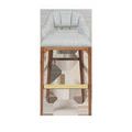 Front-facing view of Inga Stool highlighting brass kick-plate and seat cushion
