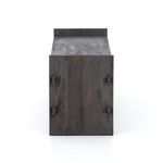 End view of trunk showing flat wood side panel with pegged joints