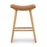 Front view of stool showing symmetrical leg structure and horizontal footrest bars