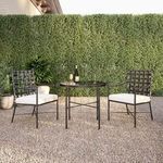 Two Provence Dining Chairs paired with petite round black metal patio table on gravel with green hedge backdrop