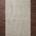 Beige rug pad with 3/8 inch thickness, textured surface, ideal for use under rugs on hard floors or carpet