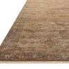 Close-up angled view showing rug’s low pile texture and stitched fringed edge
