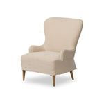 Close-up showing armrest curve and linen upholstery stitching