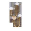 Highsmith Wall Sconce with opaque white globes front view, highlighting the brass finish and travertine mount