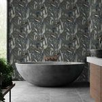 Glasshouse Wallpaper applied on bathroom wall behind modern stone bathtub, showing room context and scale