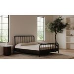 Dash accent table styled as coffee and side tables in modern living room with curved black sofa