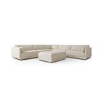 Front view of cream modular sectional and ottoman on white background