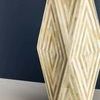 Syracuse Table Lamp with faceted bone inlay base featuring warm neutral geometric pattern and white tapered drum shade