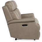 Side view showing power recline control panel on arm and padded cushions