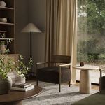 Living room scene with Bennett Chair positioned beside another chair near large window