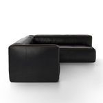 Side perspective displaying armrest details and leather grain on left side