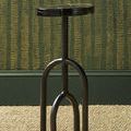 Grove Drinks Table styled in room with green textured wallpaper and natural fiber rug