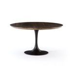 Close angle on matte black cast-iron base with smooth curves and rustic feel