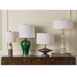 Jebel Table Lamp displayed on wooden sideboard with three other table lamps in varied styles