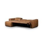 Sectional with left seat extended in power recline position exposing metal reclining mechanism