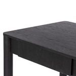 Drawer panel close-up with black wood grain and simple design