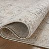Rug uniformly rolled to show pile thickness and backing weave