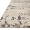 Close-up angled side view highlighting soft pile texture and color variation of Theory Taupe Grey Rug
