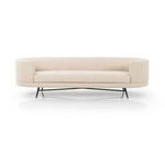 Front view of sofa highlighting continuous curved arms and plush seat cushion