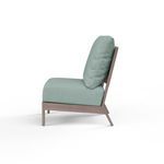 Side profile view of Laguna Armless Club chair showing angled backrest and cushion thickness