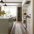 Runner version of Francis rug in kitchen, narrow length with same grid and border pattern