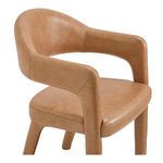 Close-up of Martens chair top and armrest showing stitched tan leather detail