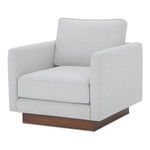 Three-quarter view showing chair's angled arm and seat cushions