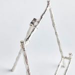 Top angled view of easel highlighting bamboo-style silver finish and rear support arm