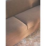 Close-up showing detailed seat cushion seam and linen fabric texture