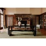 Post dining bench styled in an elegant dining room setting with matching dining table, chairs, and a decorative vase cente...