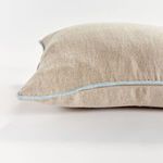 Close-up of Elias Pillow texture and fabric weave with focus on blue piping
