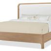 Right angled view highlighting bed frame’s wood grain and leather headboard