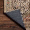 Folded corner showing dark gray backing and tightly stitched edge of Loren Charcoal Multi Rug