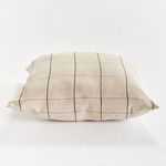 Louis Pillow flat laying viewed from side, showcasing grid alignment and thickness