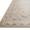 Angled corner view of Loren Sand Taupe rug showing stitched edge and intricate border