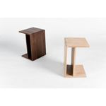 Pair of accent tables, one in matte walnut and the other in light natural wood finish against white background