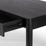 Top corner close-up showing wood grain and smooth rounded edge