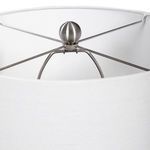 Interior view of lamp shade frame with brushed nickel finial and support structure