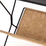 Close focused detail on stitching and weave of natural hemp fabric sling used in Monarch Magazine Rack