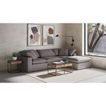 Contemporary living room setup featuring Terra Condo Ottoman with chaise sofa