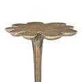 Close angled perspective highlighting oxidized finish on tabletop edge and stem texture