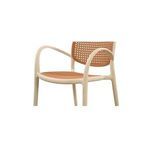 Close-up of Soren chair armrest and seat weaving texture in rust color