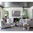 Two Roca Spot tables styled in bright modern living room near white sofas and large windows