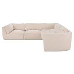 Matina Classic L Modular Sectional in beige chenille with oversized cushioned seats and sculptural curved frame